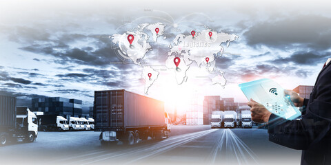 Smart logistics and transportation. Concept, Businessman use tablet and analyzing on logistic global network distribution on world map background