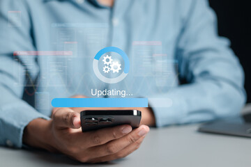 Businessman working and installing update process. Software updates or operating system upgrades to keep your device up to date with enhanced functionality in new versions and improved security.