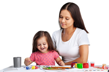 Happy mother and cute little girl doing homework,writing and painting.