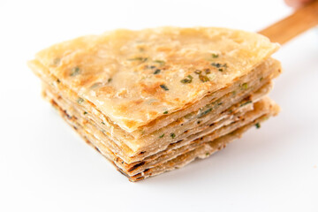 Cooked and cut hand-grabbed cake