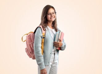 Happy student schoolgirl holding books