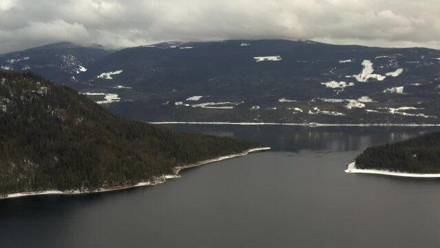 Cloudy Day Serenity: Aerial Footage of Shuswap Lake's Peaceful Landscape