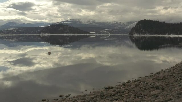 The Beauty Within: Aerial Exploration of Shuswap Lake's Rocky Beach and Stunning Reflections
