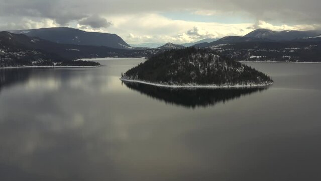 Copper Island's Pristine Majesty: Aerial Exploration of Shuswap Lake's Tranquil Waters and Rocky Shorelines
