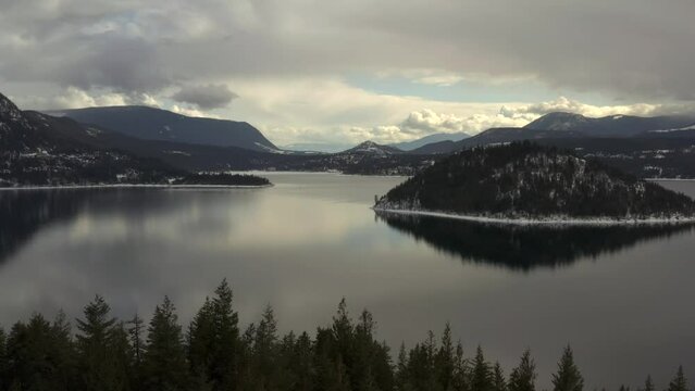 Cloudy Day Reflections at Copper Island: Aerial Views of Shuswap Lake's Enchanting Landscape
