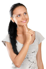 Beautiful brunette in casual attire pondering