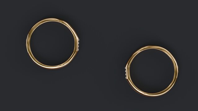 Top view of 3d render two golden rings on black background.