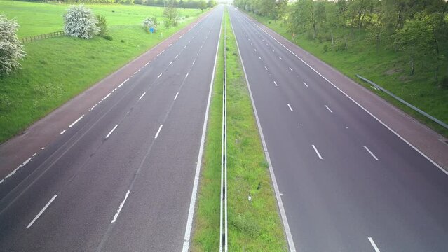 Motorway traffic at 60x normal speed near sunset long exposure time lapse over M55, Blackpool, Lancashire, UK
