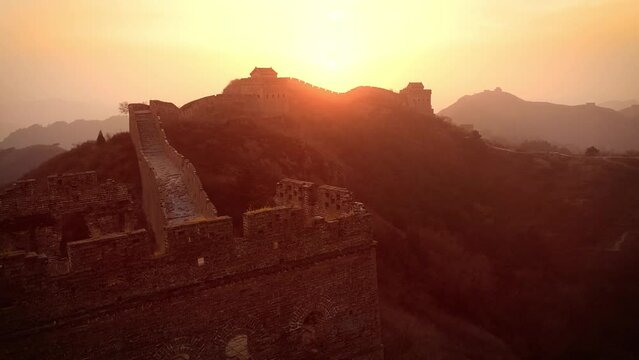 Flying over the Great Wall of China at sunset