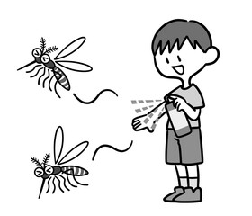 虫除けスプレーを使う男の子