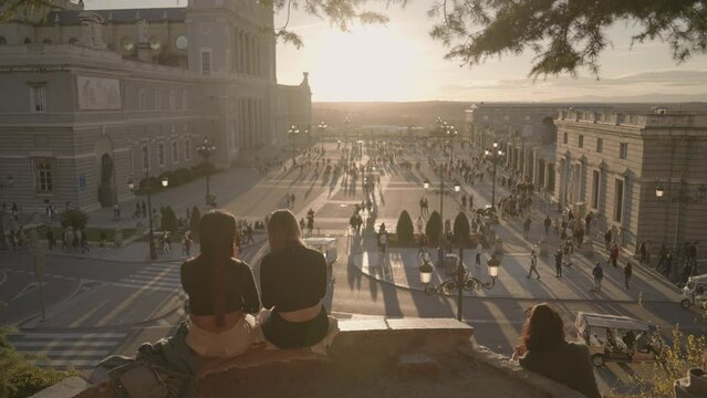 Crowd of People and Catedral de la Almudena during Sunset Madrid, Spain