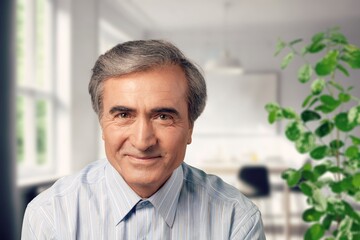 Fototapeta premium Relax, happy elderly man posing in home