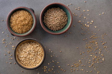 Bowls with oats, rice and lentils