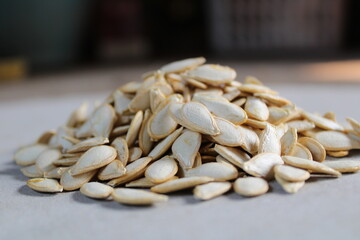 Close up pumkin seed pile.Absract background.