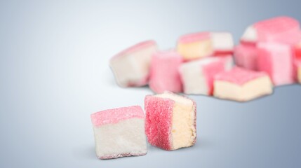 Tasty sweet colored gummies on background