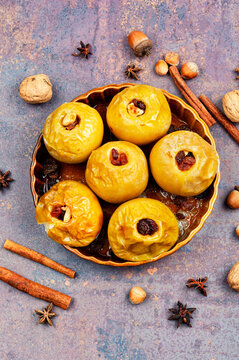 Baked autumn apples with nuts and raisins