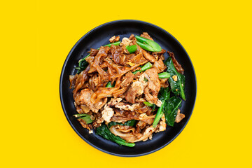 Stir-fried rice noodles with soy sauce and pork