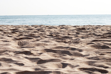Sand beach with sea and sky. Holiday summer beach
