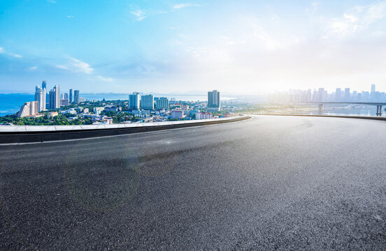 The expressway and the modern city skyline are in Chongqing, China.