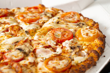 pizza with tomato and cheese