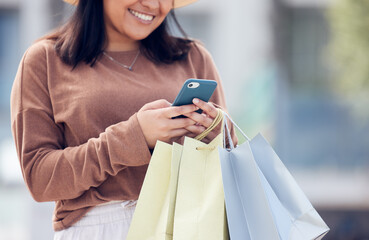 Shopping, phone and woman typing in city with bag online for sale notification, social media and...