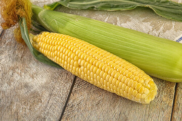 Yellow sweet raw cob corn