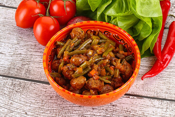 Meatball with vegetables and spices