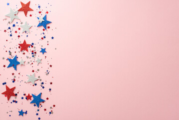 Get ready to party! Top view showcases party accessories galore: glittering stars, and shimmering confetti, set on a pastel pink backdrop with an open space for text or promotions