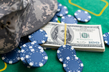 Poker cards royal flush, cash money dollar bills. Gambling, casino chips, dices. Casino tokens, gaming chips, checks, or cheques on green table in casino club.