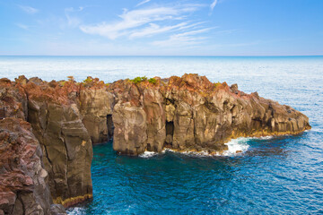 Wild rocky cliffs with columnar joints at the Jogasaki coast in Izu town, Shizuoka prefecture, Chubu, Japan. © Tanya