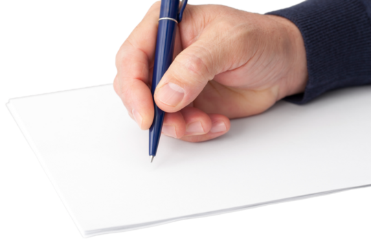 Hand  With a Pen on White Sheets