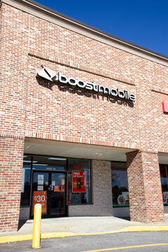Boost Mobile retail store exterior entrance and sign