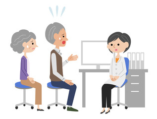 診察室で女医に不安を話すシニア夫婦