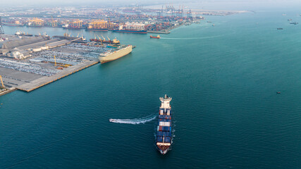 cargo container ship carrying in sea to import export goods and distributing products to dealer and consumers across asia pacific worldwide, global business and industry delivery service  by ship