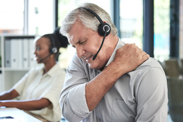 Stress, callcenter and man with shoulder pain in customer service agency, senior manager with...