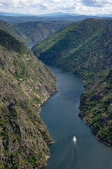 Fototapeta na wymiar Aerial view of Canyons of the Sil river in the Ribeira Sacra zone of Galicia in springtime since Vilouxe viewpoint. Ourense, Spain.