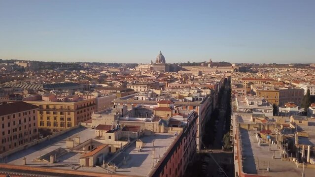 Aerial Cinematic drone downtown  Piazza Rome Italy birds flying past buildings and streets of Vatican City St Peters Europe Sistine Chapel morning upward movement