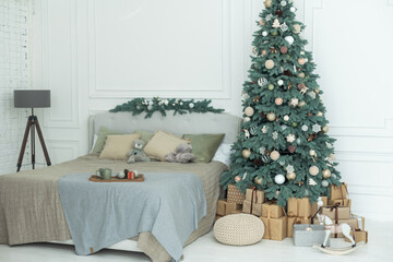 Many beautiful gift boxes under Christmas tree