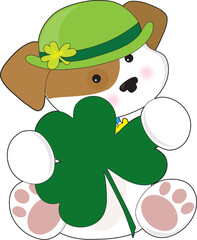 A cute puppy is wearing a green Irish hat and is holding a large green shamrock.
