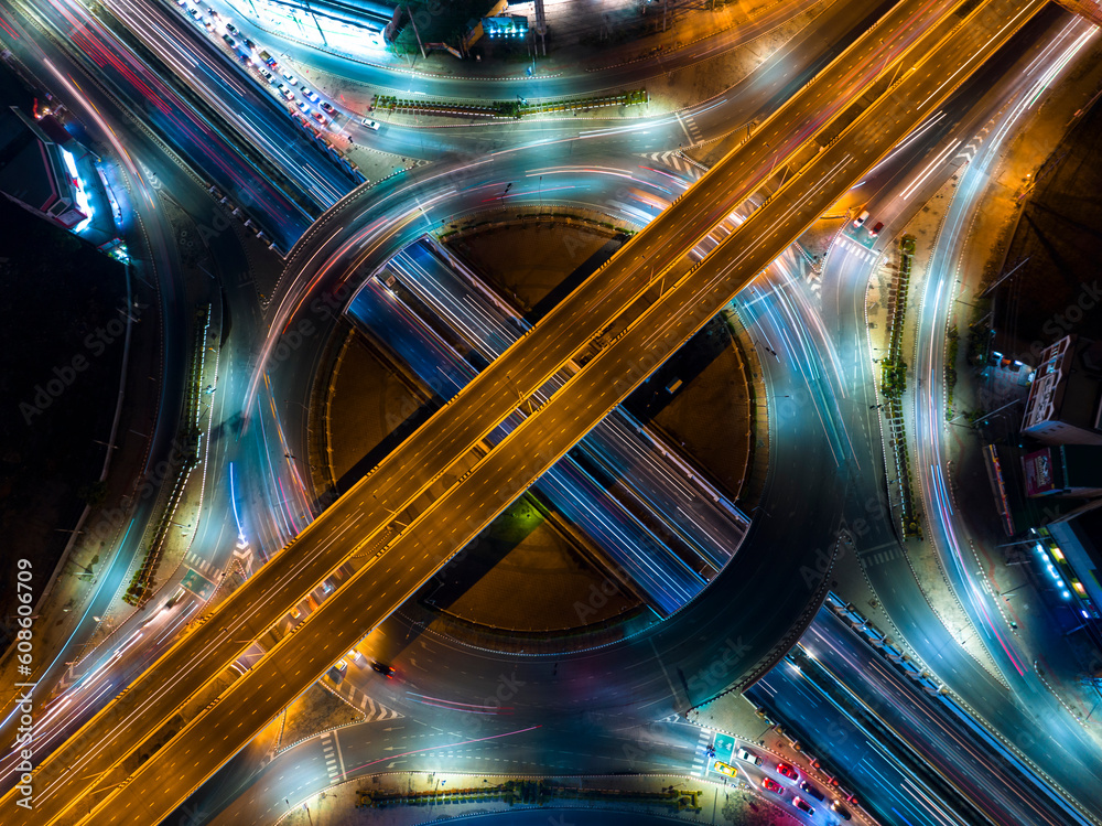 Canvas Prints Expressway top view, Road traffic an important infrastructure, car traffic transportation above intersection road in city night, aerial view cityscape of advanced innovation, financial technology	 - Canvas Prints