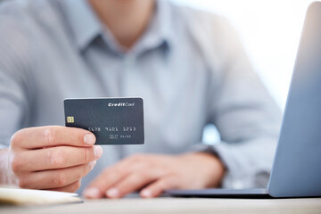 Hand, credit card and e commerce with man and laptop, corporate account and finance with payment on website. Businessman, online shopping with internet banking, investment and trading with fintech