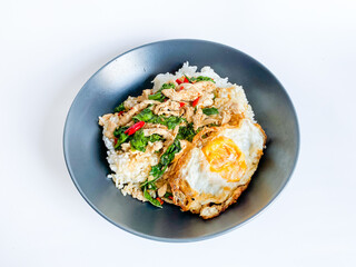 Rice topped with chicken with Thai basil and fried egg