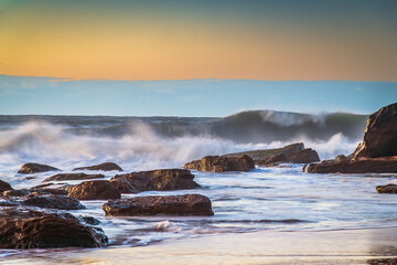 Sunrise and Waves - Surf's up at the seaside