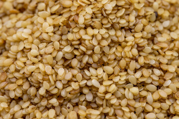 Pile of sesame seeds as background, spice or seasoning as background. Close-up Sesame seeds
