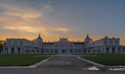 different views with reflections in the water of the royal palace of aranjuez at dawn