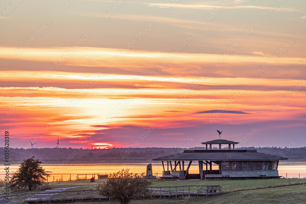 Wall mural Lake Hornborgasjön bird tower in sunset