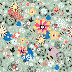 Naklejka premium Seamless colorful floral pattern on a green background