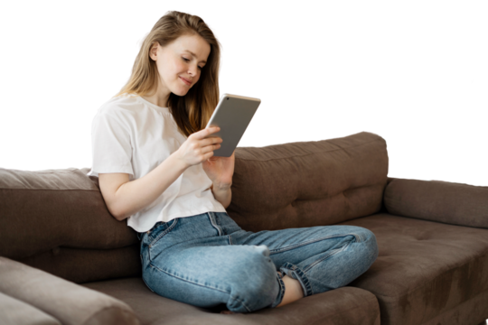 A woman uses a tablet at home on the sofa online shopping on the Internet. Transparent background, isolated. - Powered by Adobe