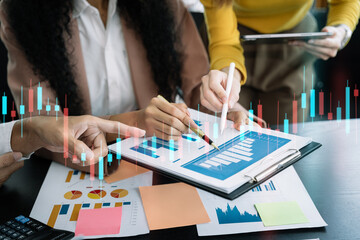 Fototapeta premium Business corporate team brainstorming, planning strategy having a discussion Analysis investment researching with chart at office desk documents in office.