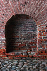 Blank arch from red brick of fortress